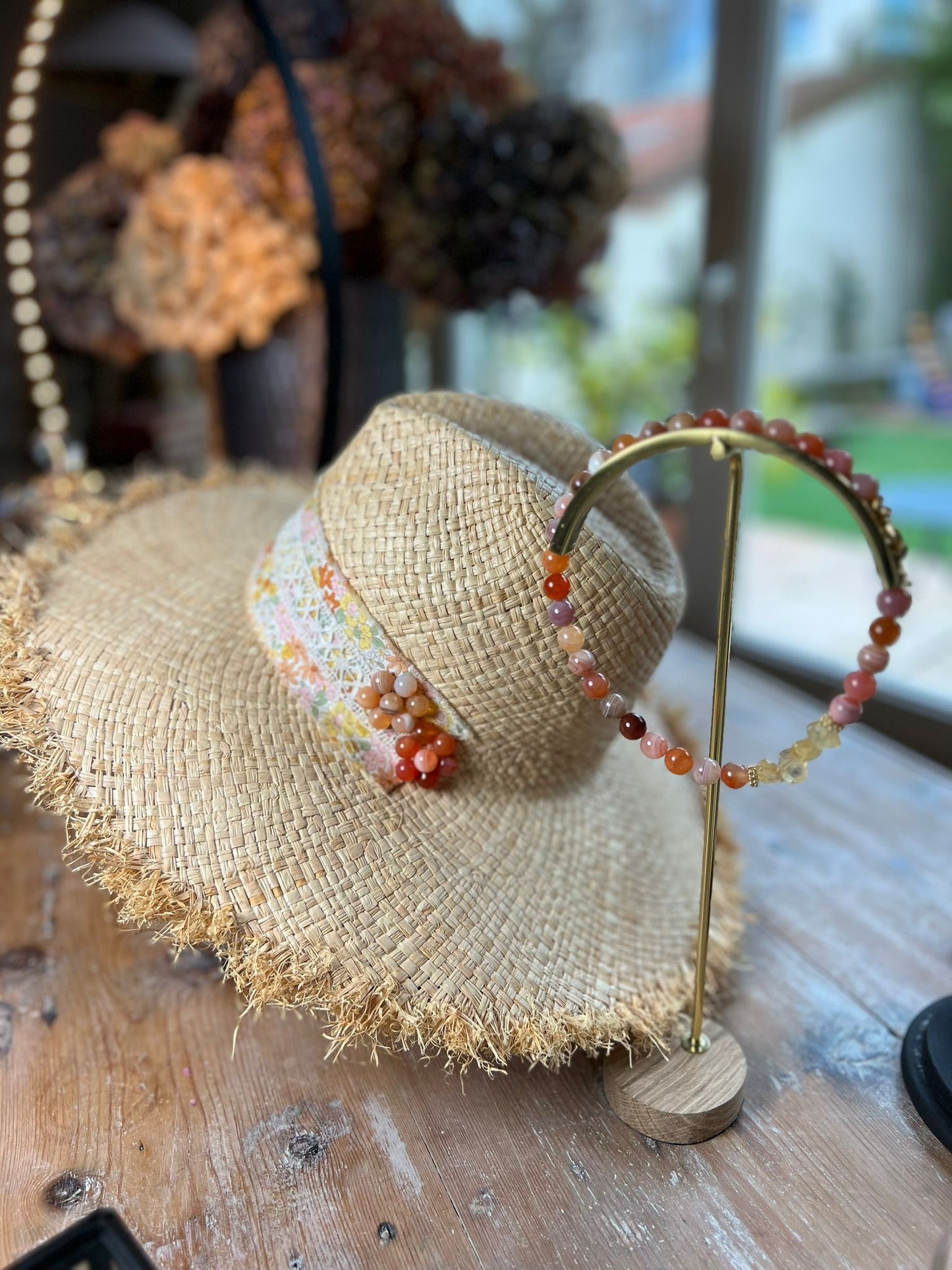 Straw hat with stones